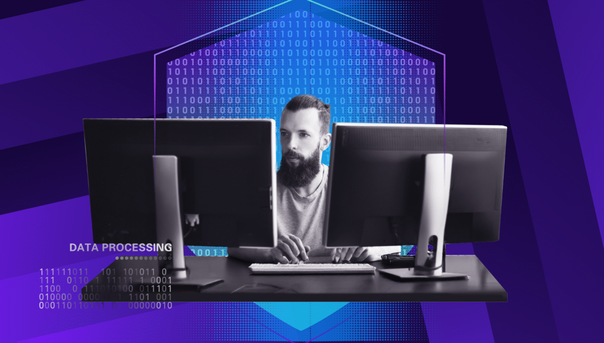 Person working on dual monitors with binary code overlay and text reading Data Processing, representing user protection and secure data handling