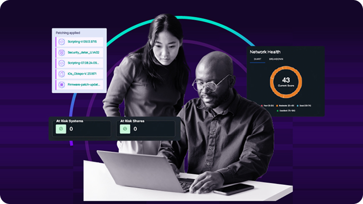 Two individuals working on a laptop with overlay graphics showing patching applied, network health score, and at-risk systems