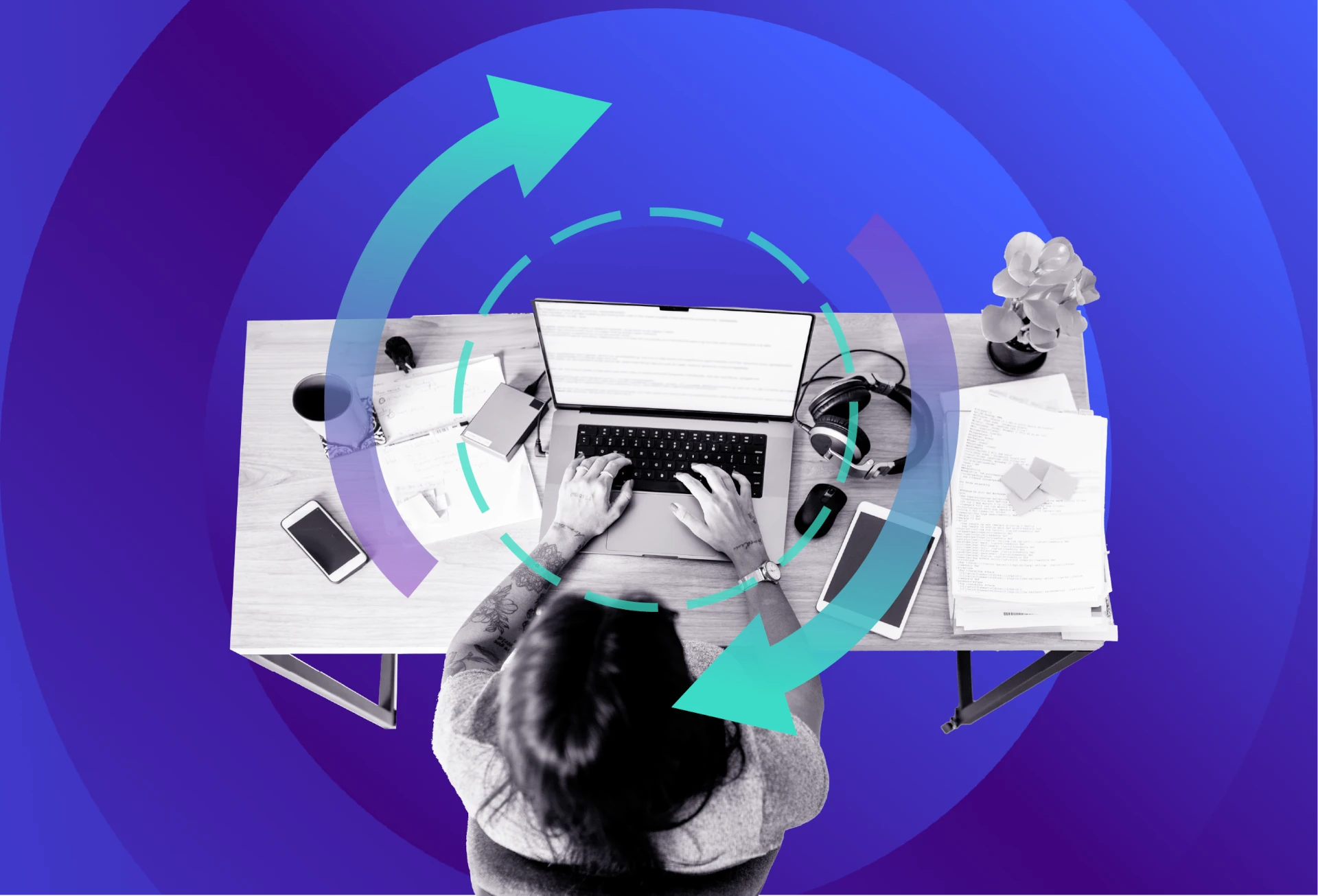 IT professional working at a laptop with backup and recovery workflow graphics representing data protection.